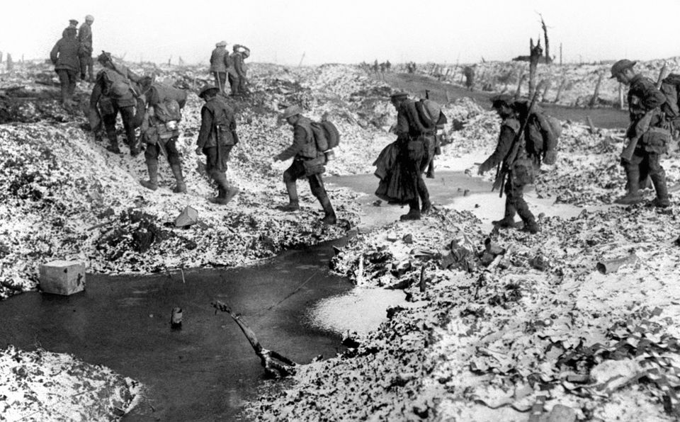 British soldiers negotiating a shell-cratered