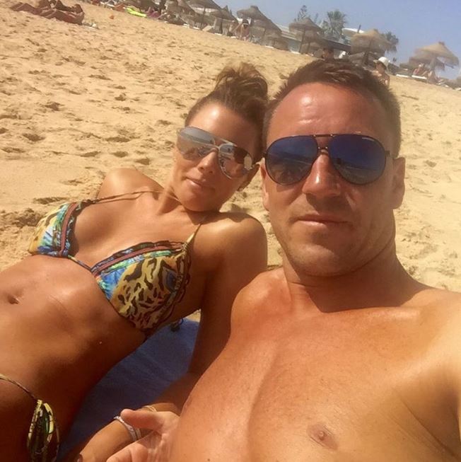 John Terry relaxes on the beach with wife Toni hours after admitting England's Euro 2016 elimination had given him a sleepless night