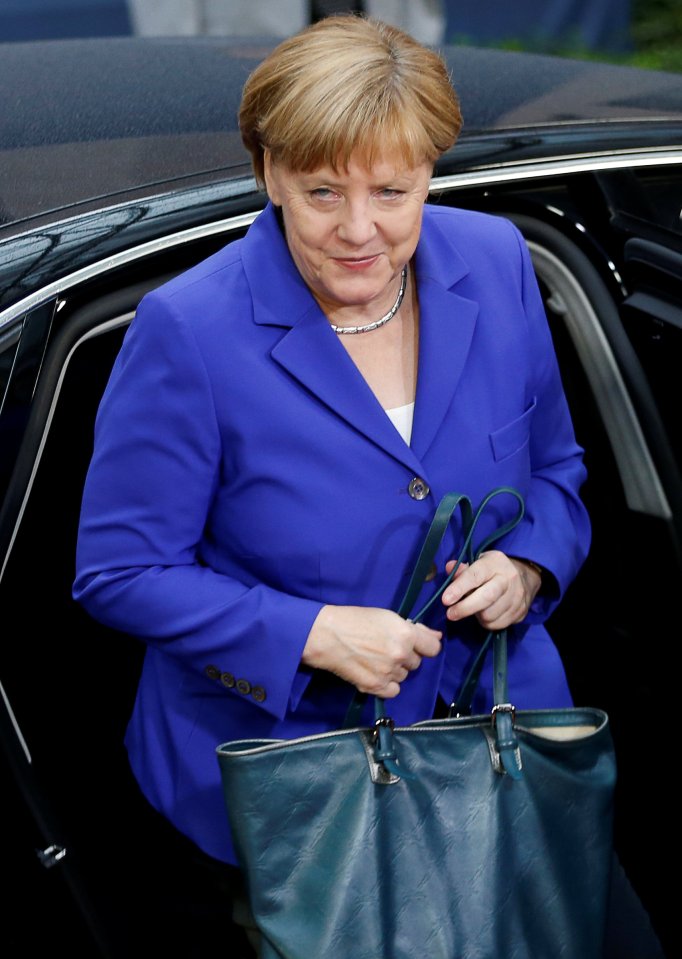  Germany's Chancellor Angela Merkel arrives for the negotiations after David Cameron warned migration was key to the Brexit vote