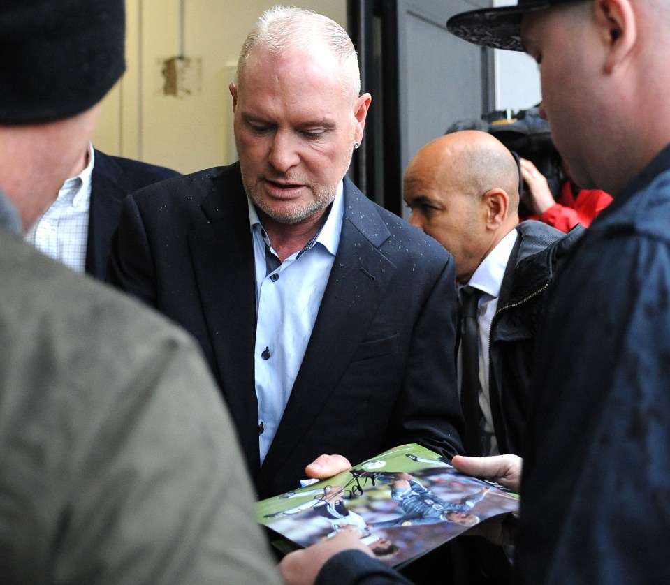  The troubled star signed autographs for fans as he arrived at court