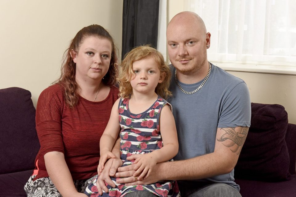 Pictured: Stephanie Ross, Amber Ross and Gareth Ross. A mother has spoken of her outrage after her three-A mother today spoke of her outrage that her three-year-old daughter came home from pre-school with severe sunburn, saying staff failed to apply the sunscreen she provided. Mum of two Stephanie Ross was horrified when she discovered her daughter Amber's back and shoulders were bright red when she got home from the school in Locks Heath, Hants. Amber had only been attending Jigsaw Pre-School for a few months when the incident occurred. The youngster had been sent to school wearing a summer dress and a hoodie at the time but when she returned from school her mum found she was sunburned, despite a school policy to put suncream on children in sunny weather. SEE OUR COPY FOR DETAILS. ¿ Tom Harrison/Solent News & Photo Agency UK +44 (0) 2380 458800