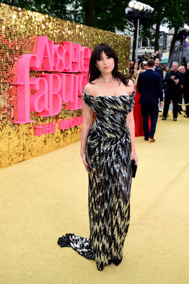  Model Daisy Lowe also plumped for a black patterned gown as she posed alongside the Ab Fab sign