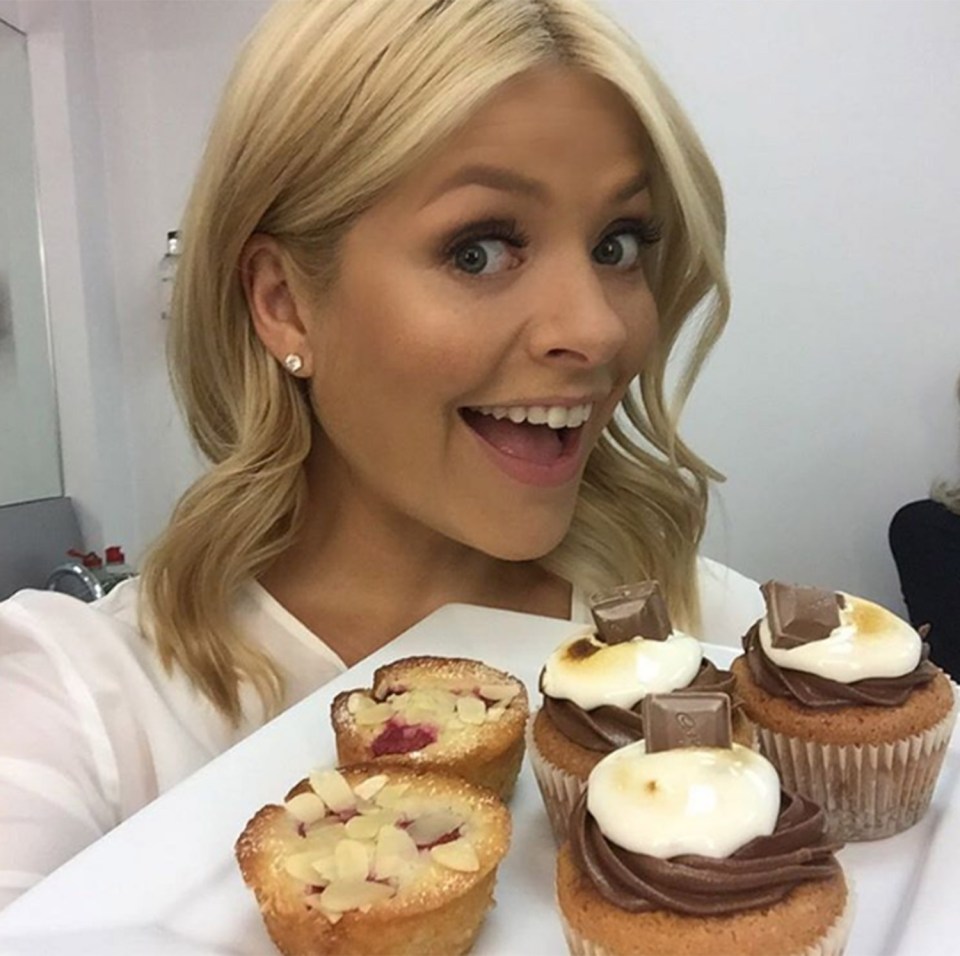 Holly shared a cute snap which showed her posing with cakes for breakfast