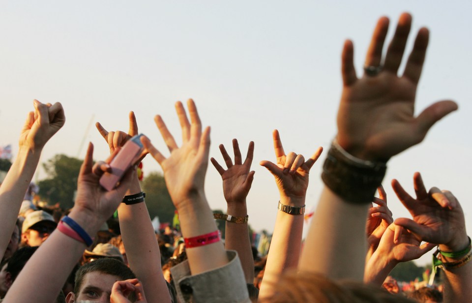  These music fans at the Isle of Wight festival should snip that strap the minute they get home