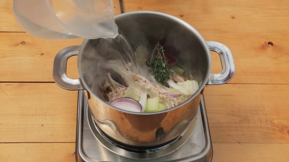  Add ingredients to carcass to make soup