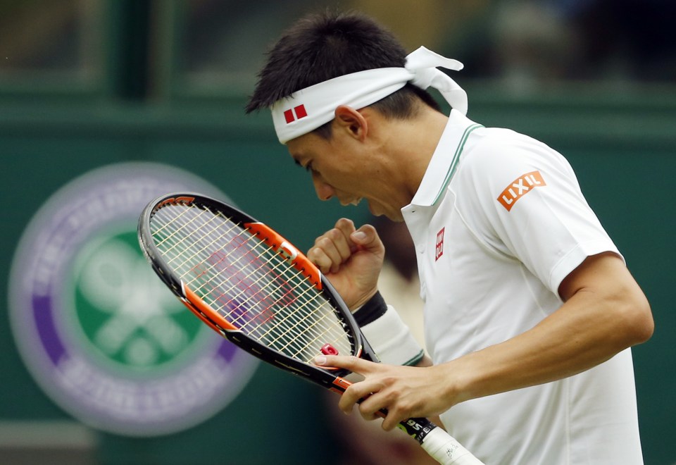  Kei Nishikori of Japan celebrates a point against Julien Benneteau as he closes in on victory