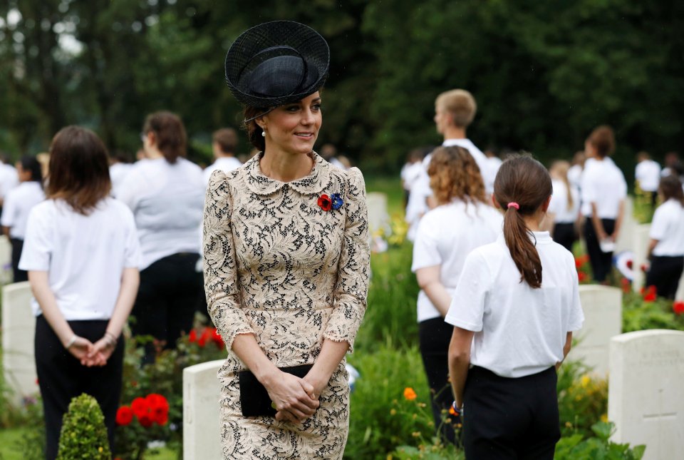  Kate stands near a group of children who were taking part in the memorial