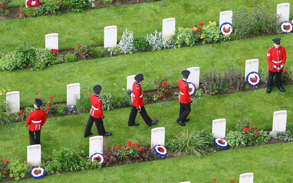  Wreaths are lain at the graves of the dead