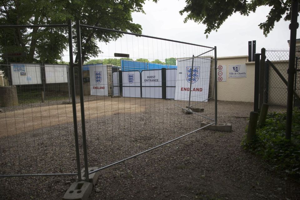 Another view of the fence erected around England's training facility in Chantilly