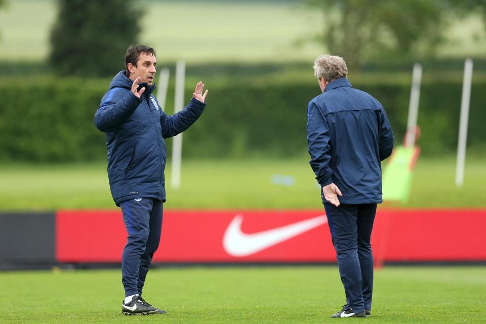 Gary Neville and Roy Hodgson will be taking England training behind tight security