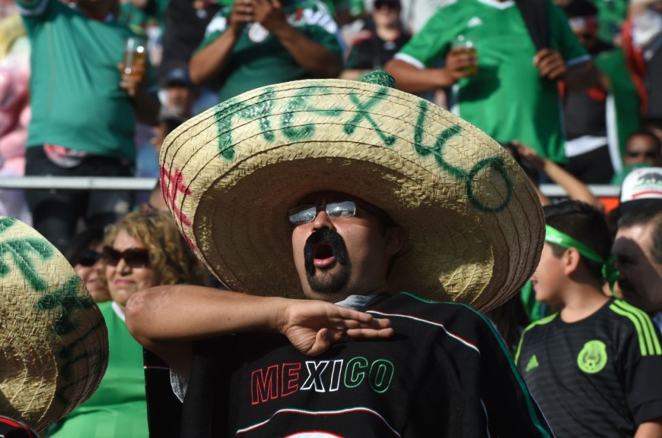 A fan of Mexico sings the anthem during the Copa America Centenario football tournament in Pasadena, California, United States, on June 9, 2016. / AFP PHOTO / Mark RALSTONMARK RALSTON/AFP/Getty Images