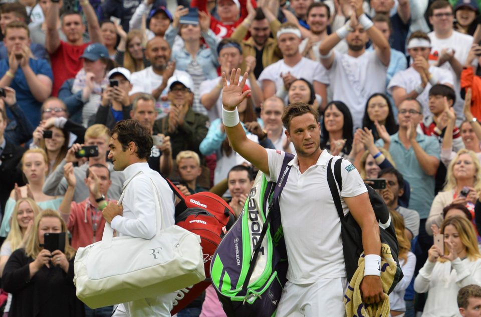  Marcus Willis takes the applause after his defeat against Roger Federer