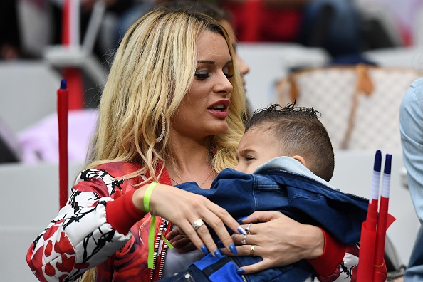  Mrs Dimitri Payet and son. He's clearly got his dad's hair. How about his right foot?