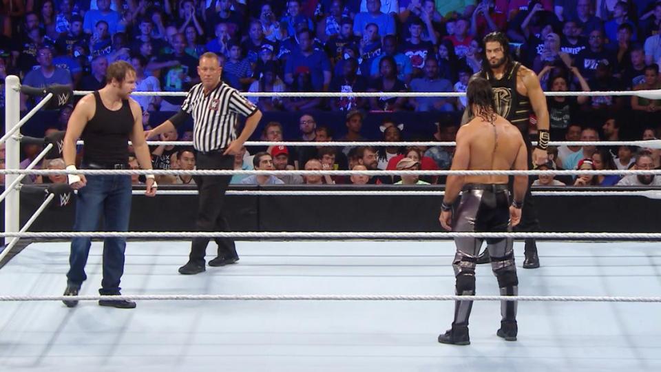 The champ was taking on Roman Reigns and Seth Rollins