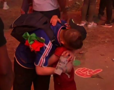  The fan is then consoled by a kind young Portuguese boy