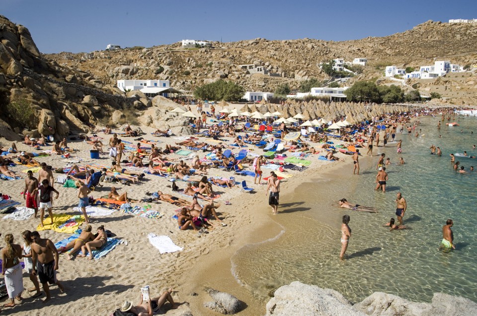  Alessandra got her tan on at the public Psarou beach