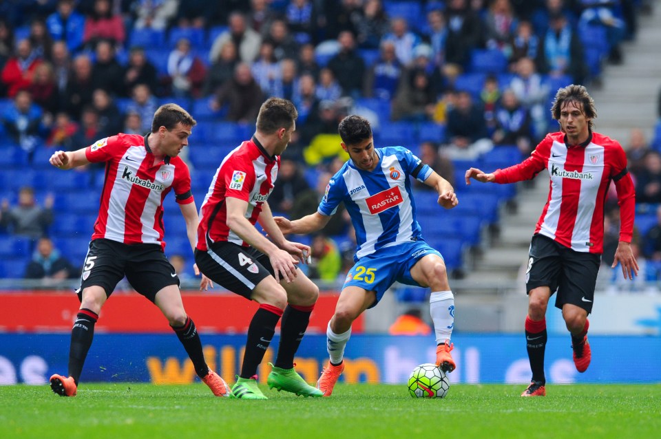  Marcos Asensio, on loan at RCD Espanyol, competes for the ball with Athletic Bilbao players during the La Liga match at Cornella-El Prat Stadium