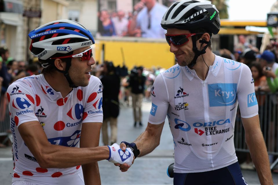 Britain's Adam Yates (right) was in the yellow jersey briefly before the race officials decided Froome could be in Yellow