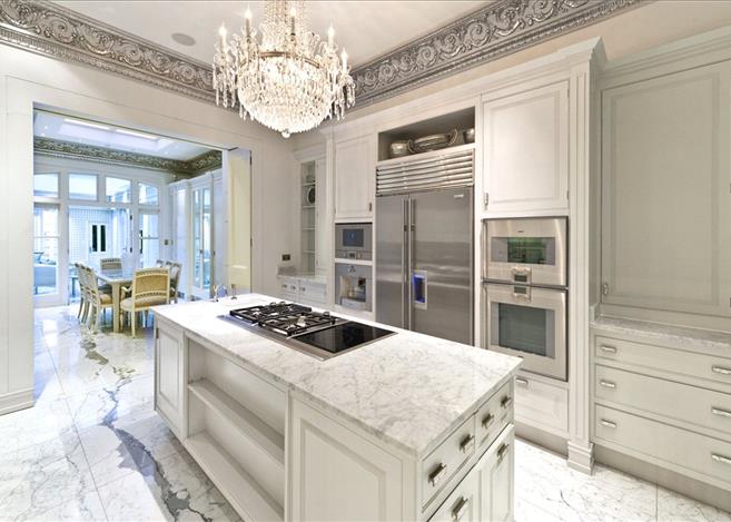 The stunning white kitchen is spacious and stylish, offering a unique space to cook up a storm