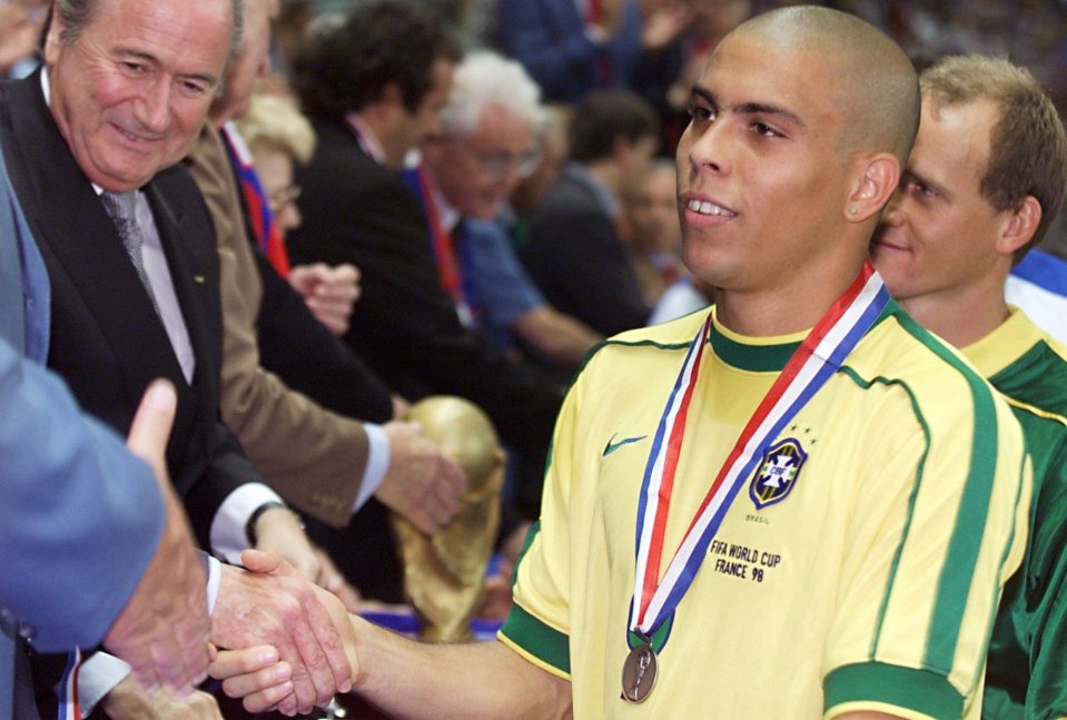  Ronaldo tries to smile as he collects runners up medal in Paris at France 98