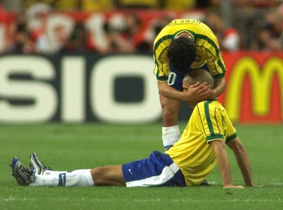  Ronaldo is consoled by team-mate, Bebeto, after World Cup final defeat