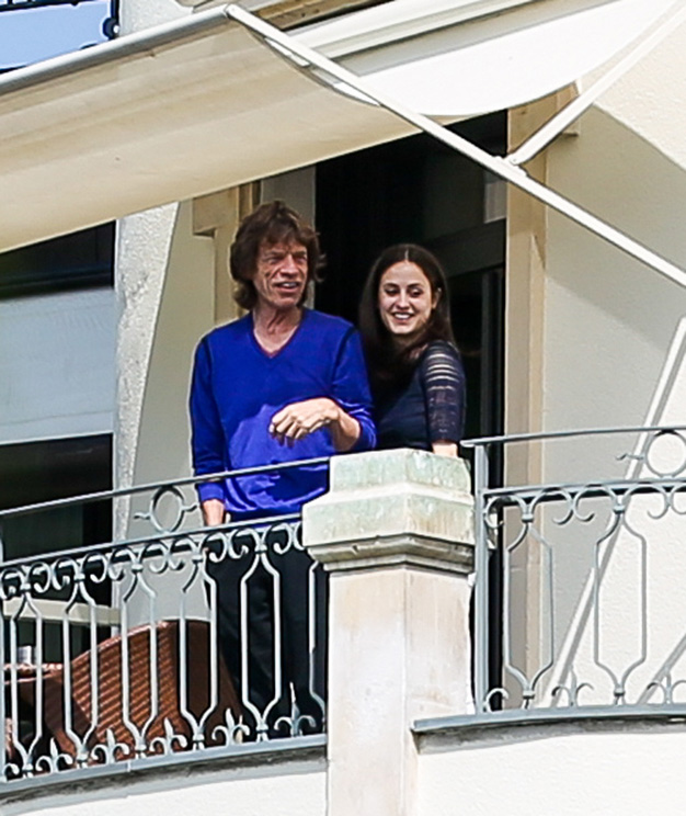  Balcony . . . Mick and Mel laugh together