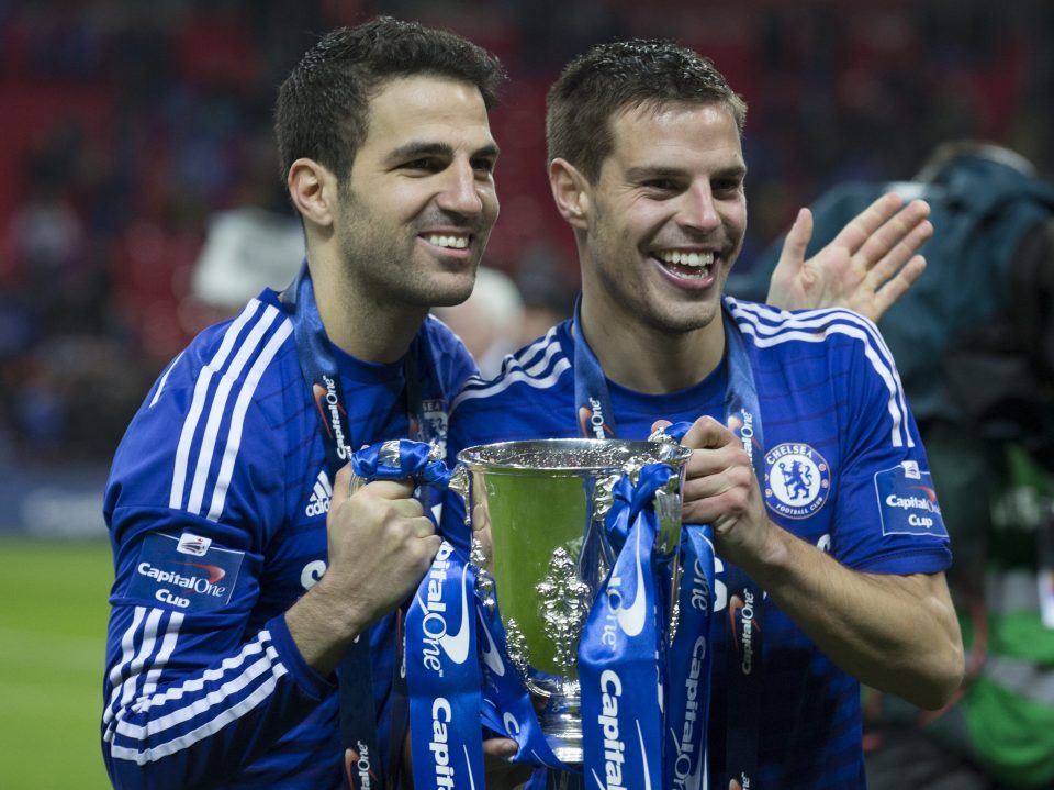  Cesar Azpilicueta celebrates winning the Capital One Cup alongside Cesc Fabregas