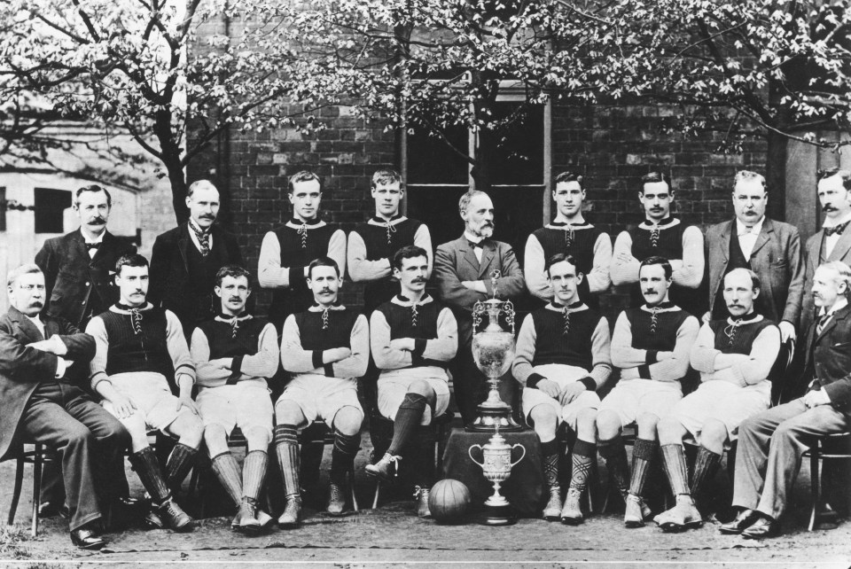 The Aston Villa FC team of 1897, the year in which the team won The Double - the League Championship and the FA Cup. Back row, left to right: secretary George Ramsay, trainer J. Grierson, Howard Spencer (1875 - 1940), keeper James Whitehouse (1873 - 1934), chairman Margoschis, Albert Evans (1874 - 1966), James Crabtree (1871 - 1908), director T. Lees, and director C. Johnston. Front row, left to right: director Dr V. Jones, Jimmy Cowan (1868 - 1915), Charlie Athersmith (1872 - 1910), John Campbell (1871 - 1947), captain Jack Devey (1866 - 1940), Fred Wheldon (1869 - 1924), John Cowan (1870 - 1937), Jack Reynolds (1869 - 1917) and director Frederick Rinder. (Photo by Popperfoto/Getty Images)