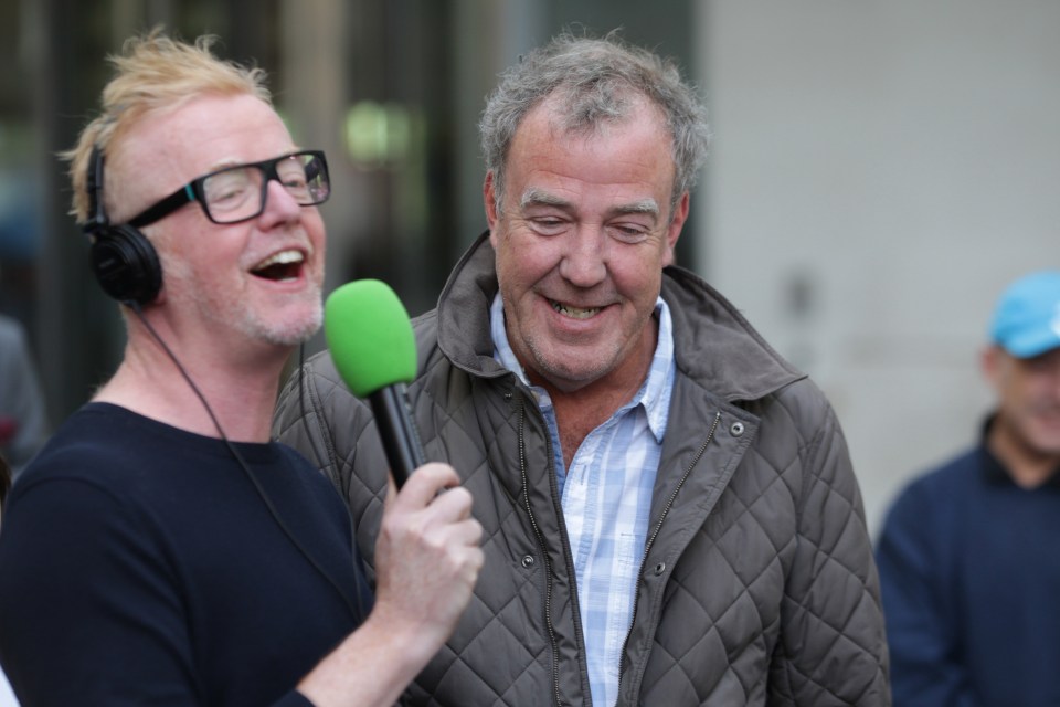 Former Top Gear TV Presenter Jeremy Clarkson being interviewed by Chris Evans outside the BBC Studios with some classic cars - London