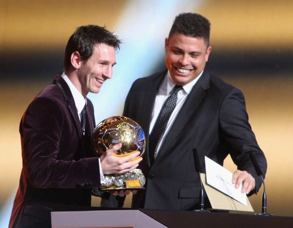  Ronaldo presents Lionel Messi with his third Ballon d'Or award in 2011