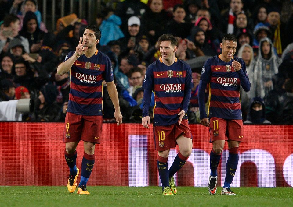 Barcelona's Uruguayan forward Luis Suarez (L) celebrates his goal with Barcelona's Argentinian forward Lionel Messi (C) and Barcelona's Brazilian forward Neymar (R) during the UEFA Champions League Round of 16 second leg football match FC Barcelona vs Arsenal FC at the Camp Nou stadium in Barcelona on March 16, 2016. / AFP PHOTO / JOSEP LAGOJOSEP LAGO/AFP/Getty Images