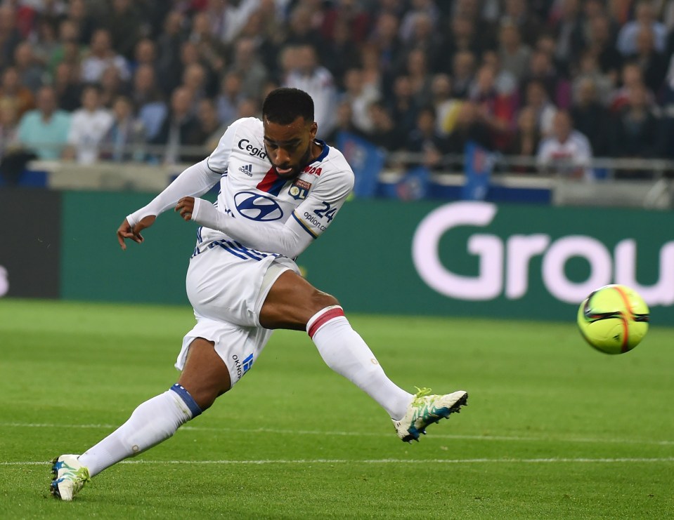 Lyon's French forward Alexandre Lacazette shoots the ball during the French L1 football match Olympique Lyonnais and AS Monaco on May 7, 2016, at the New Stadium in Decines-Charpieu near Lyon, southeastern France. AFP PHOTO/PHILIPPE DESMAZESPHILIPPE DESMAZES/AFP/Getty Images