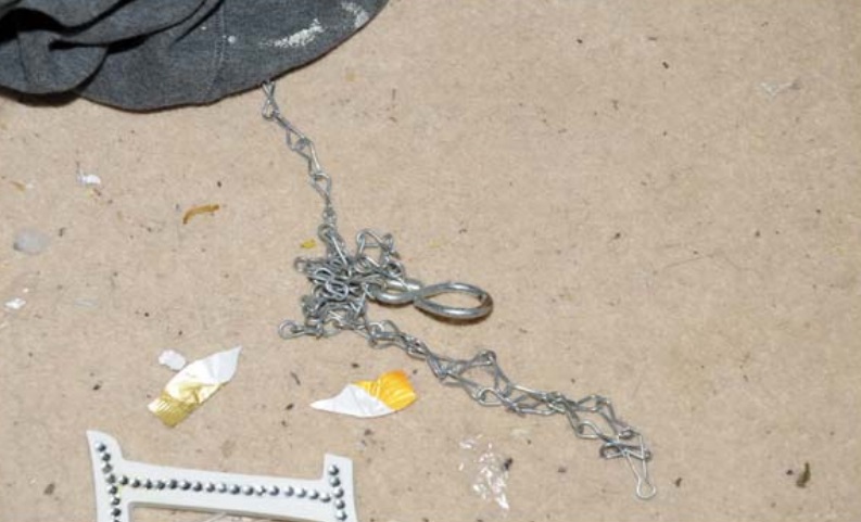  Sickening photos showed chains the evil pair used to tie the toddler up