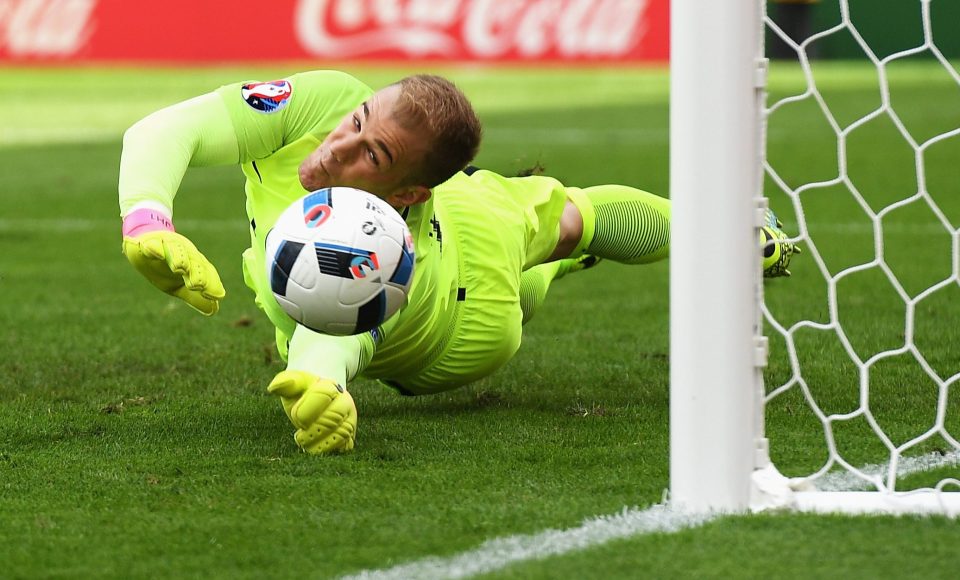  Whoops! Joe Hart lets Gareth Bale's free kick squirm past him against Wales