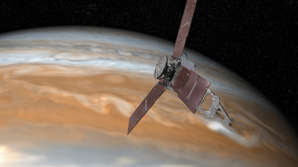 An artist's impression of NASA's Juno spacecraft making one of its close passes over Jupiter