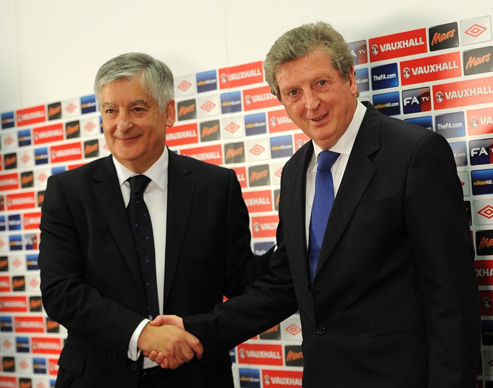 David Bernstein shakes hands with Roy Hodgson after the England manager is appointed in 2012