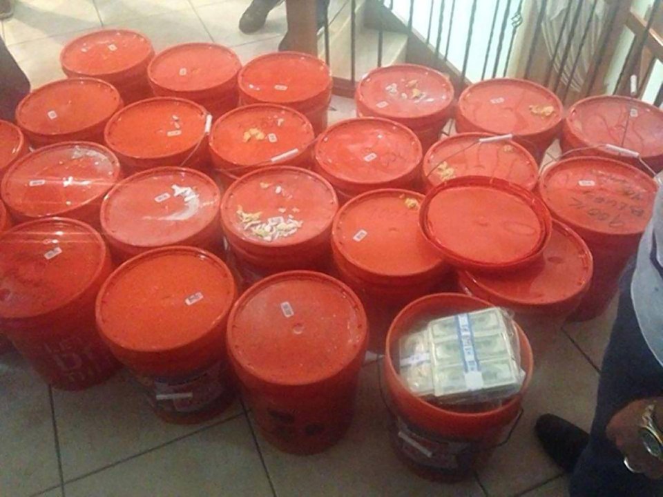  The cash was stashed in orange heat-sealed buckets with Home Depot labels