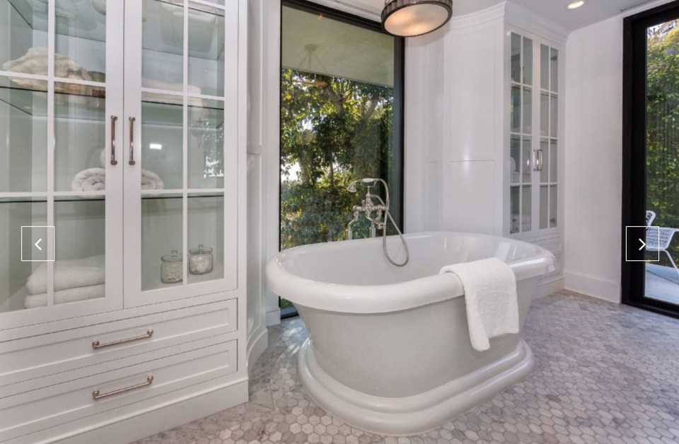  This full bathroom is one of four and a HALF in the house