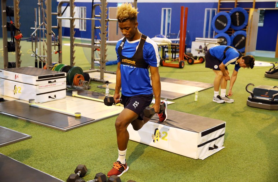 Demarai Gray performs some lunges with weights