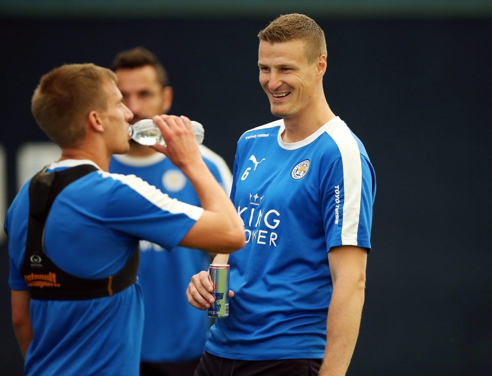 Robert Huth takes a water break during training