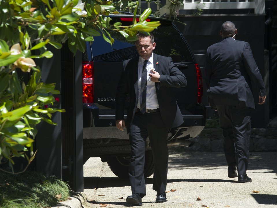  On guard ... Secret Service arrives at the home of Democratic presidential candidate Hillary Clinton in Washington