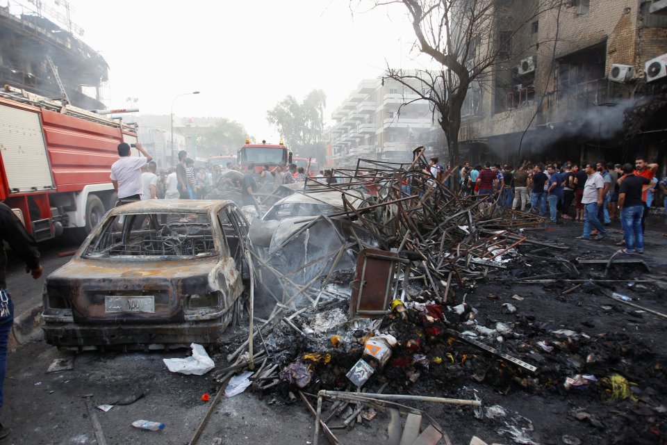  Crowds gather at the scene of the ISIS car bomb in Baghdad