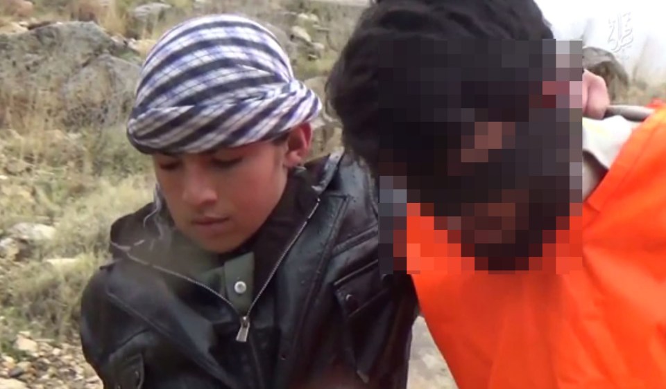  A second execution video shows a young boy leading a prisoner to his death