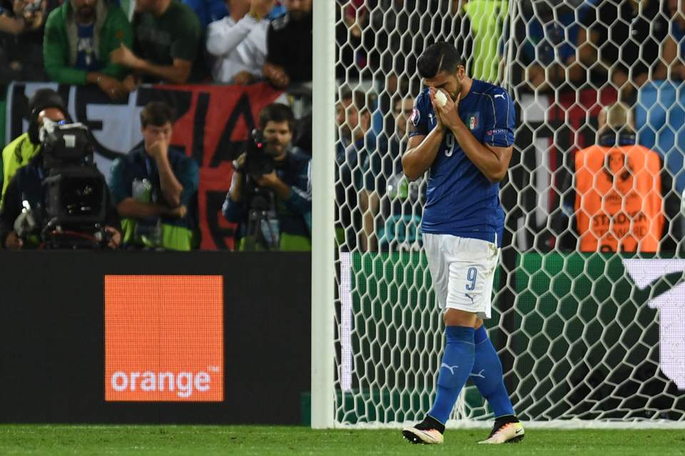 Graziano Pelle reacts to missing his penalty for Italy against Germany in the Euro 2016 quarter finals