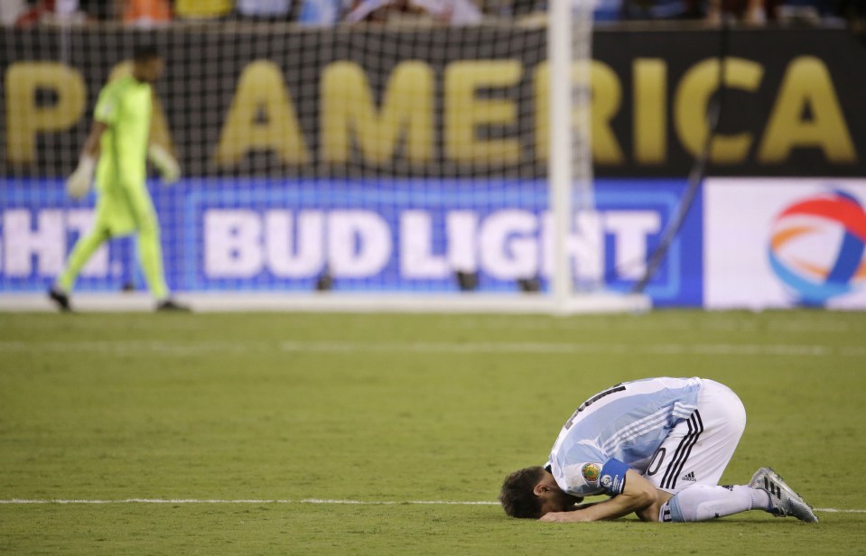  Lionel Messi is distraught after missing a penalty in the Copa America final against Chile