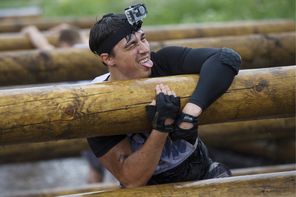 Unpleasant challenges force runners to clamber their way over cold, muddy pools of water