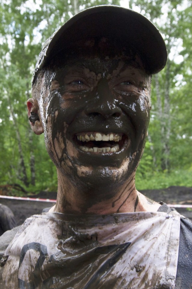 This man was all smiles after completing the uniquely-unpleasant assault course 