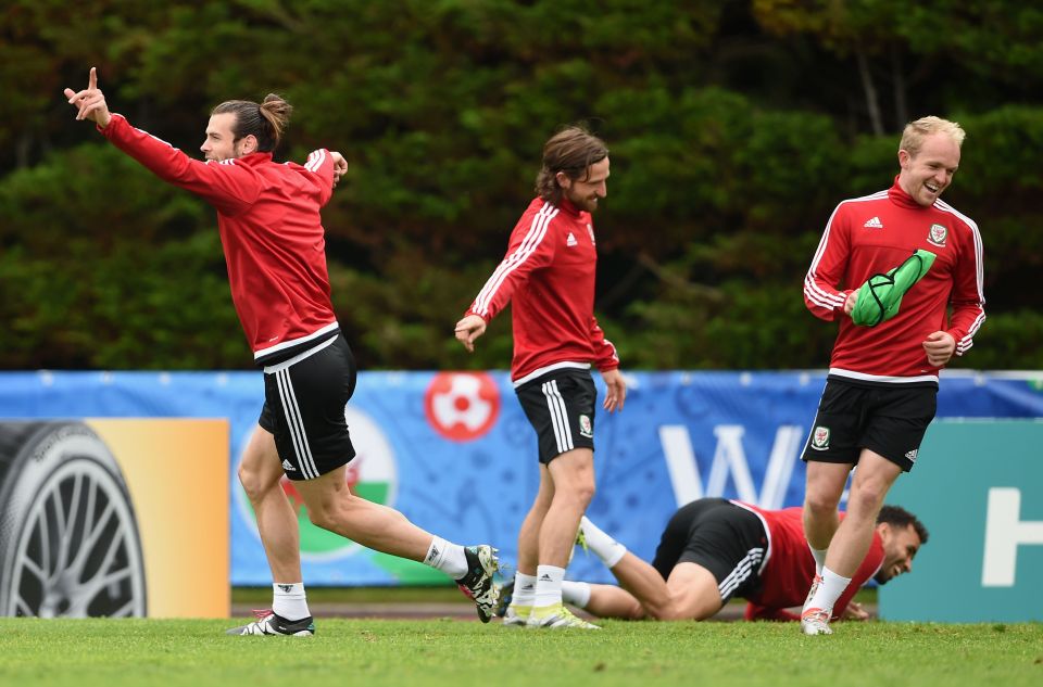  Bale celebrates a training ground goal with Robson-Kanu stranded