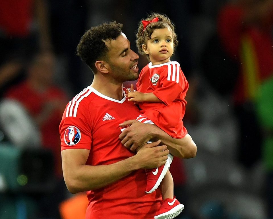  Child's play... Robson-Kanu with daughter Izabella after the Belgium match