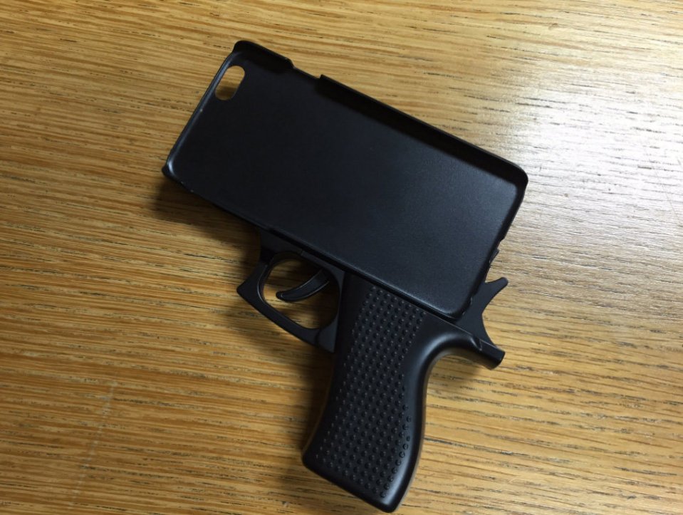  Gunning for trouble ... IPhone case has a handle and trigger